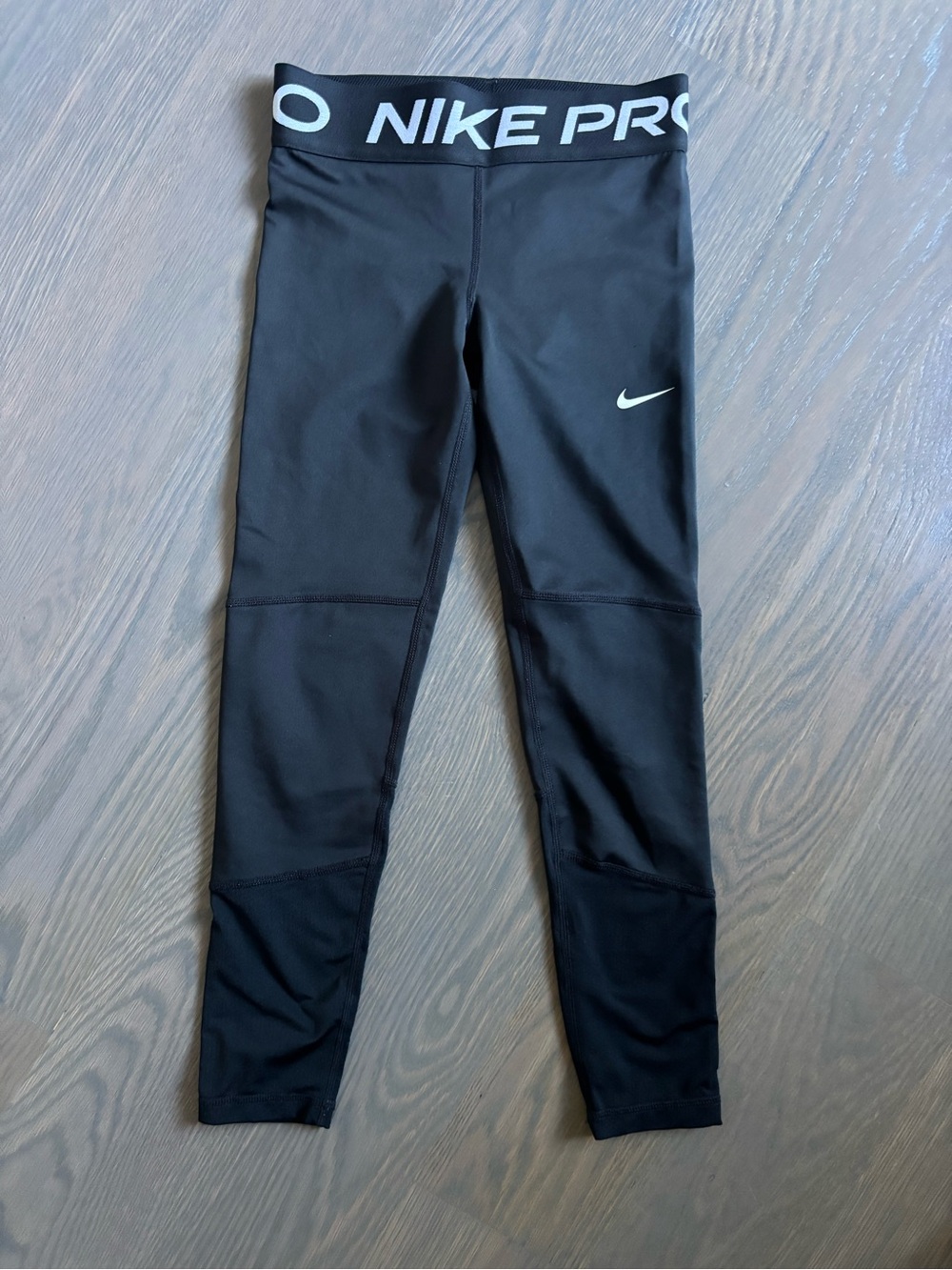 Nike Pro Kids Black Performance Leggings with White Swoosh